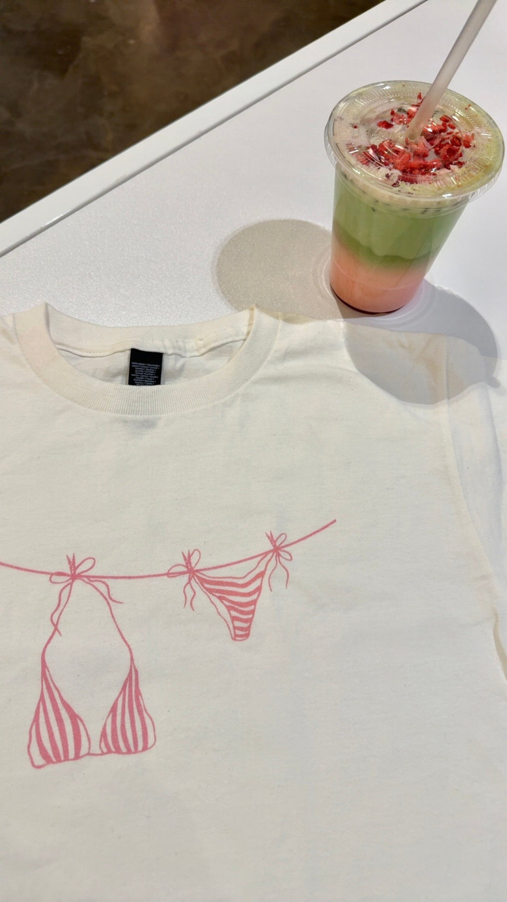Bikini Clothesline Graphic Baby Tee (Adult/Tweens)
